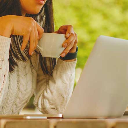 An attractive woman at a coffee shop.